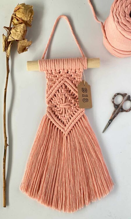 Small peach macrame wall hanging